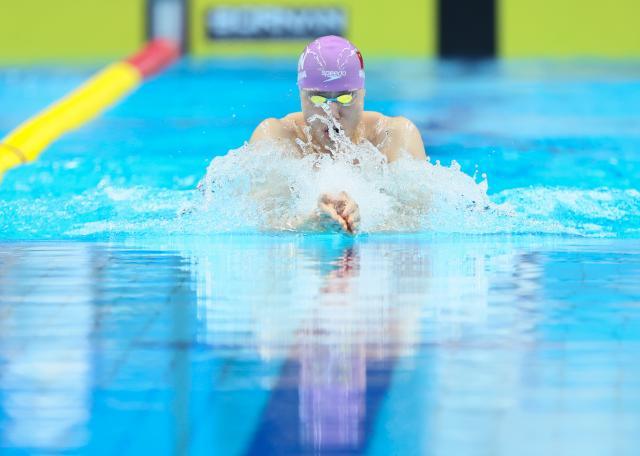 jiuyou-覃海洋摘得亚运会个人项目首金 目标50蛙世界纪录